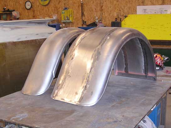 Widened, welded steel fenders